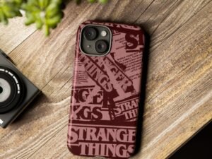 phone case — retro 'strange things' newspaper collage (burgundy)